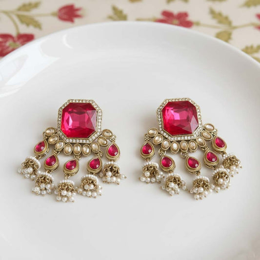 Rani Color Kundan Earrings Designed With Vibrant Ethnic Stones For Wedding And Party Wear