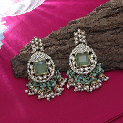 Gorgeous Pista Green Color Kundan Earrings For Wedding Style