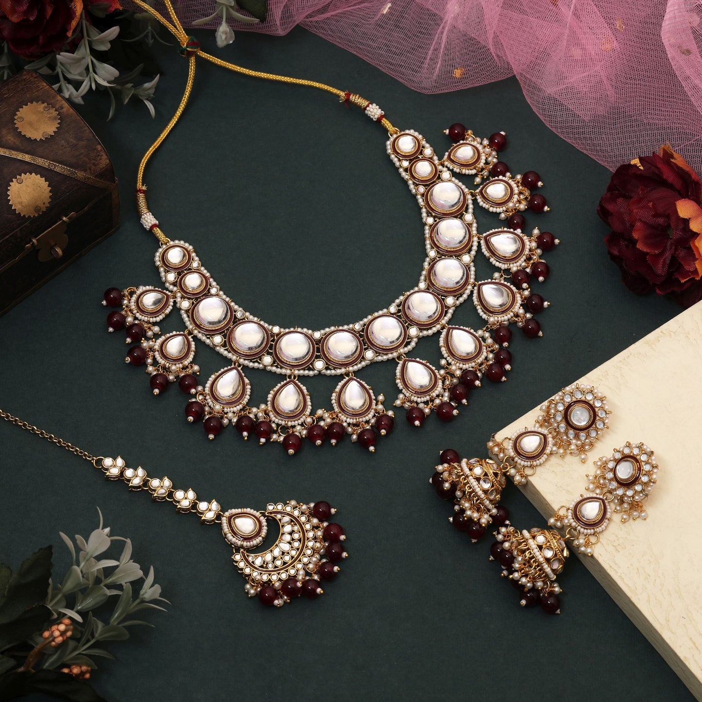 Graceful Maroon Color Kundan Necklace Set Crafted With Premium Handwork For Wedding Outfits