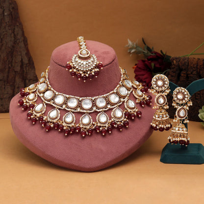Graceful Maroon Color Kundan Necklace Set Crafted With Premium Handwork For Wedding Outfits