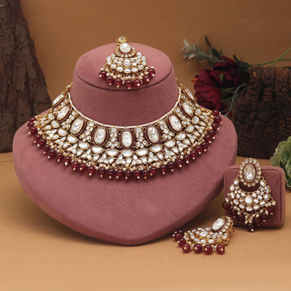 Beautiful Maroon Color Kundan Necklace Set Designed For Engagements, Festivals, And Bridal Occasions