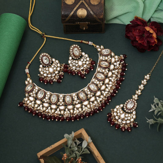 Beautiful Maroon Color Kundan Necklace Set Designed For Engagements, Festivals, And Bridal Occasions
