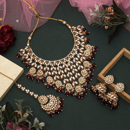 Royal Maroon Color Kundan Necklace Set Crafted With Exquisite Handmade Work For Wedding Celebrations