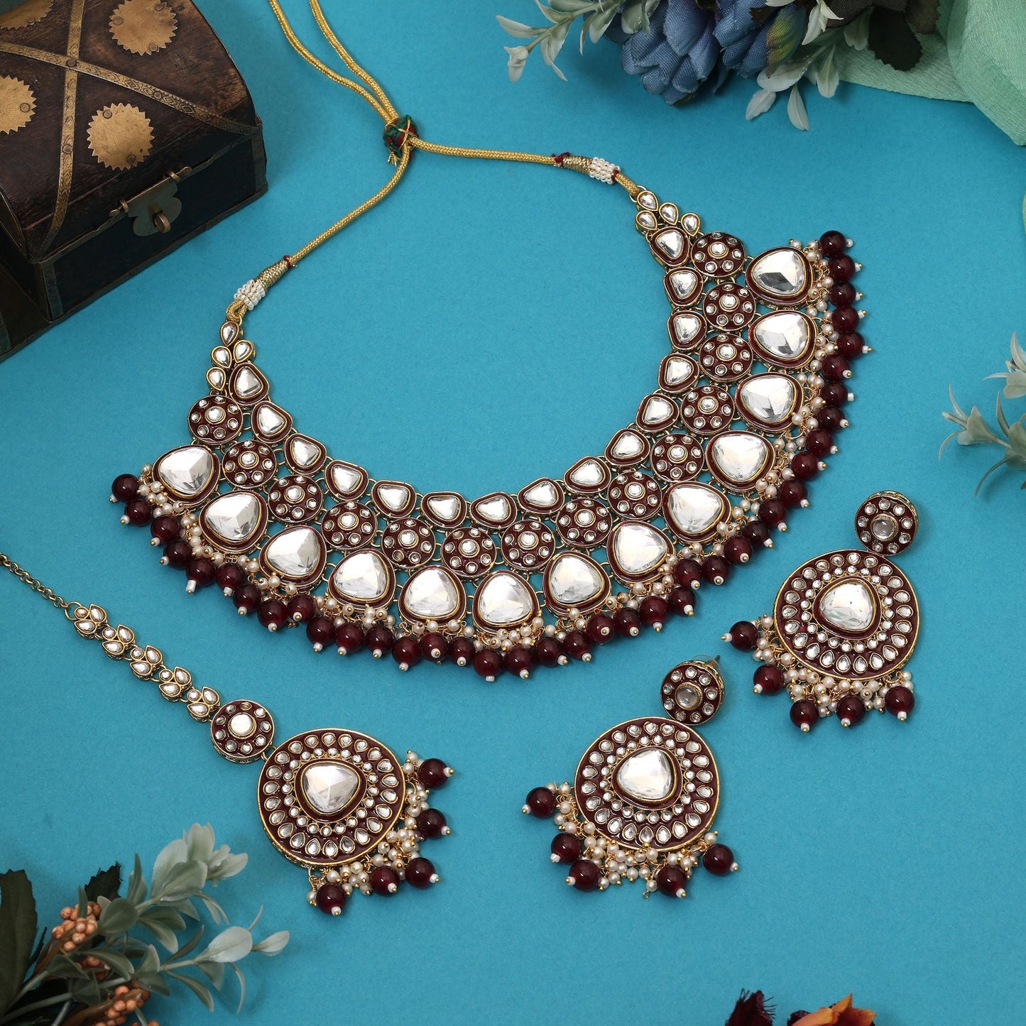 Gorgeous Maroon Color Meena Work Kundan Necklace Set Designed With Artistic Detailing For Brides