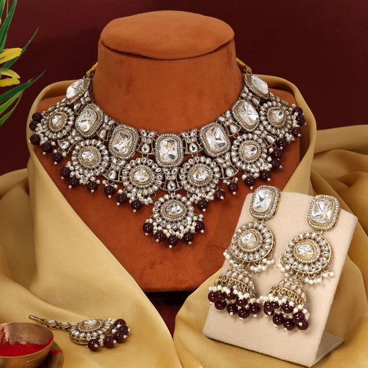 Elegant Maroon Color Kundan Necklace Set With Gold Polish For Royal Outfits