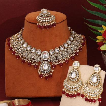 Classic Maroon Color Kundan Necklace Set With Elegant Craftsmanship For Brides