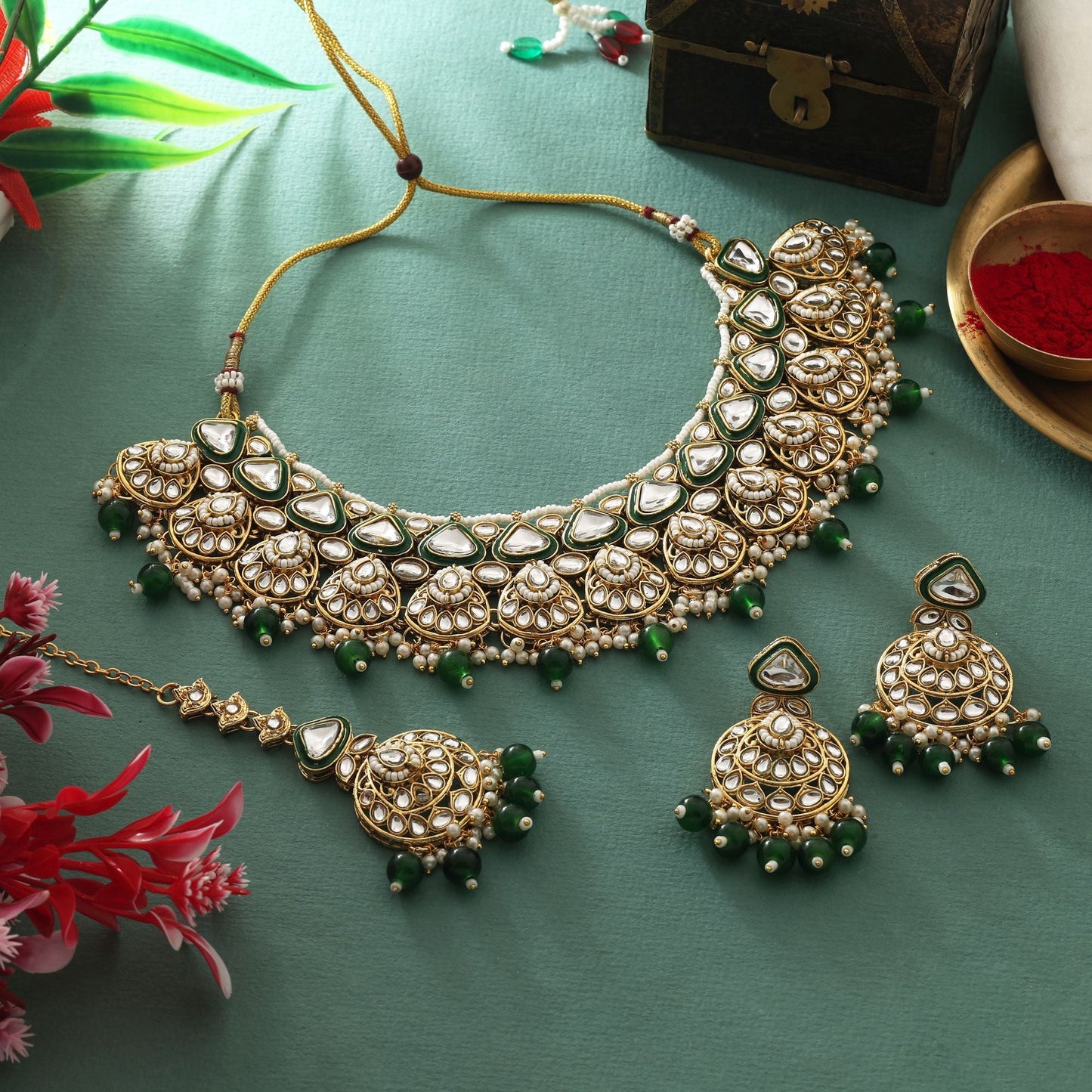 Graceful Green Color Kundan Necklace Set With Gold Polish For Festive Wear