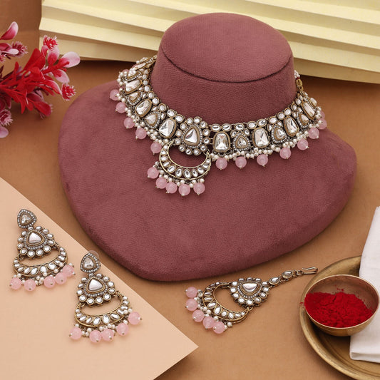 Beautiful Pink Color Kundan Necklace Set With Stone Embellishments For Brides