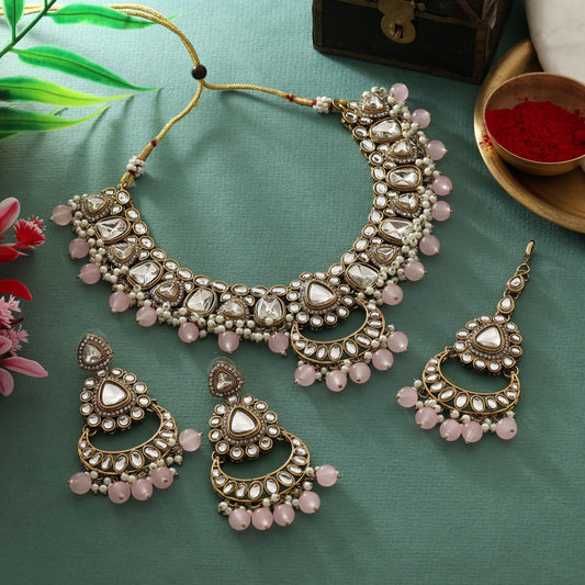 Beautiful Pink Color Kundan Necklace Set With Stone Embellishments For Brides