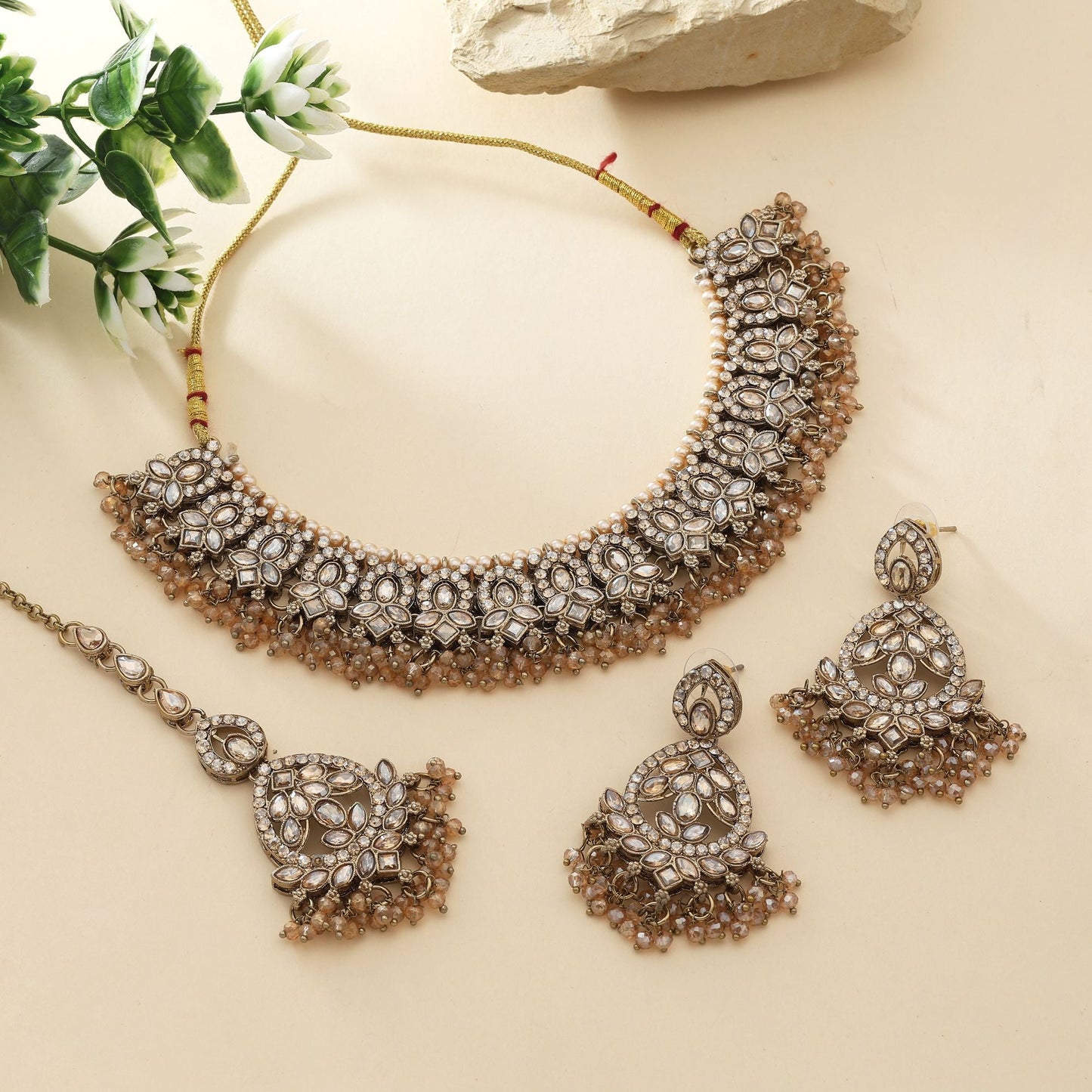 Designer Gold Color Kundan Necklace Set With Pearls And Sparkling Detailing