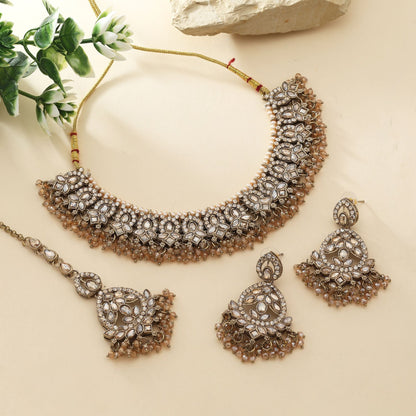 Designer Gold Color Kundan Necklace Set With Pearls And Sparkling Detailing