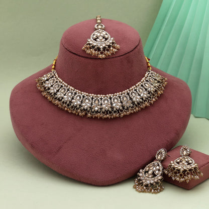 Designer Gold Color Kundan Necklace Set With Pearls And Sparkling Detailing