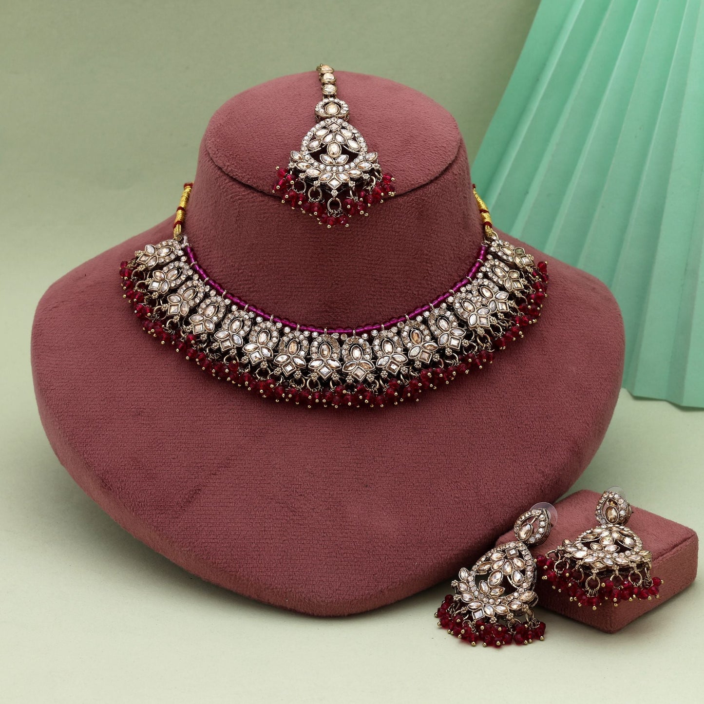 Classic Rani Color Kundan Necklace Set With Polished Stones For Wedding Functions