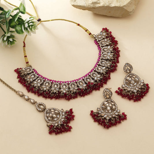 Classic Rani Color Kundan Necklace Set With Polished Stones For Wedding Functions