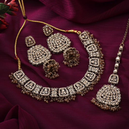Glamorous Gold Color Kundan Necklace Set With Matching Earrings For Party Outfits