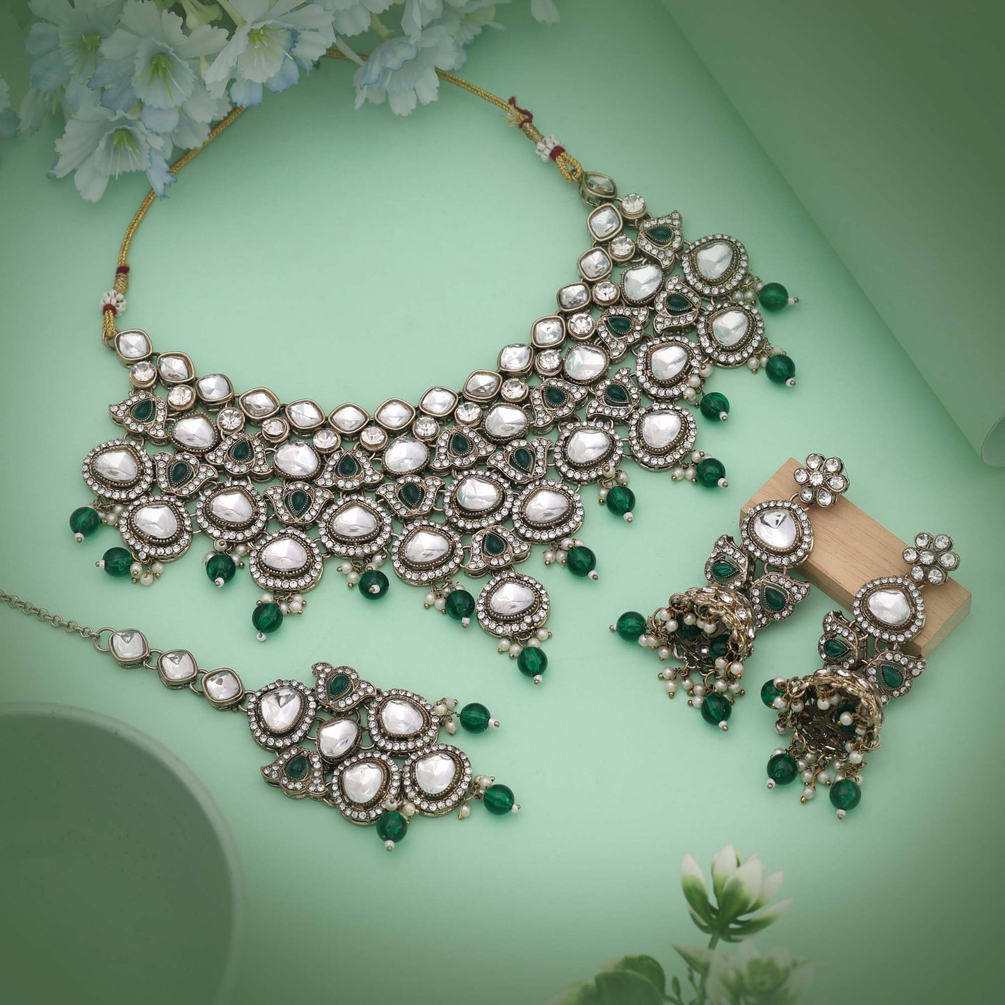 Charming Green Color Kundan Necklace Set Highlighting Rich Tones For Ethnic Sophistication