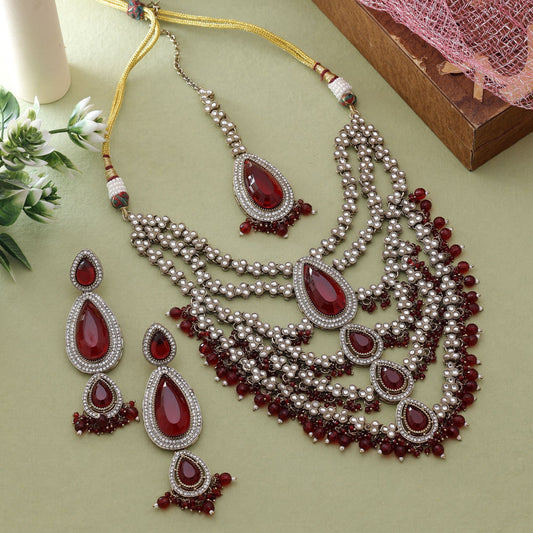 Maroon Color Kundan Necklace Set Styled For Grand Wedding Looks