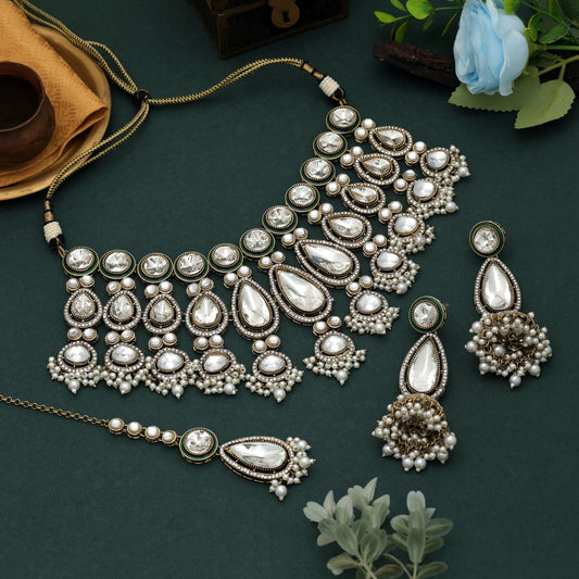 Elegant White Color Kundan Necklace Set With Sophisticated Ethnic Bridal Detailing