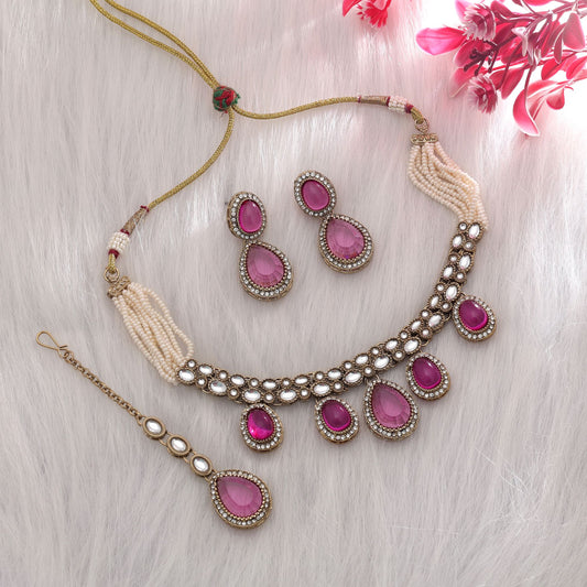Graceful Rani Color Kundan Necklace Set With Elegant Ethnic Bridal Design