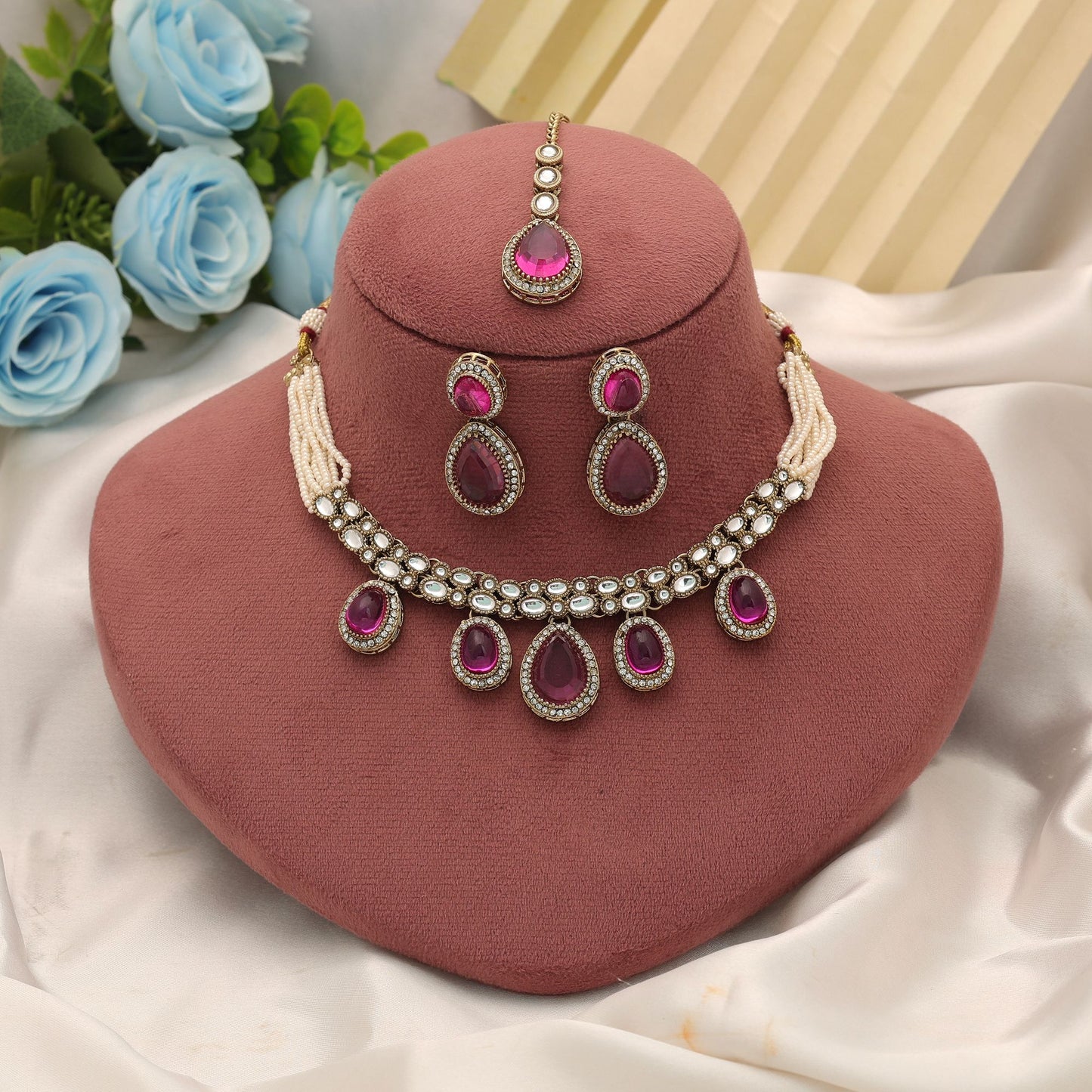 Graceful Rani Color Kundan Necklace Set With Elegant Ethnic Bridal Design