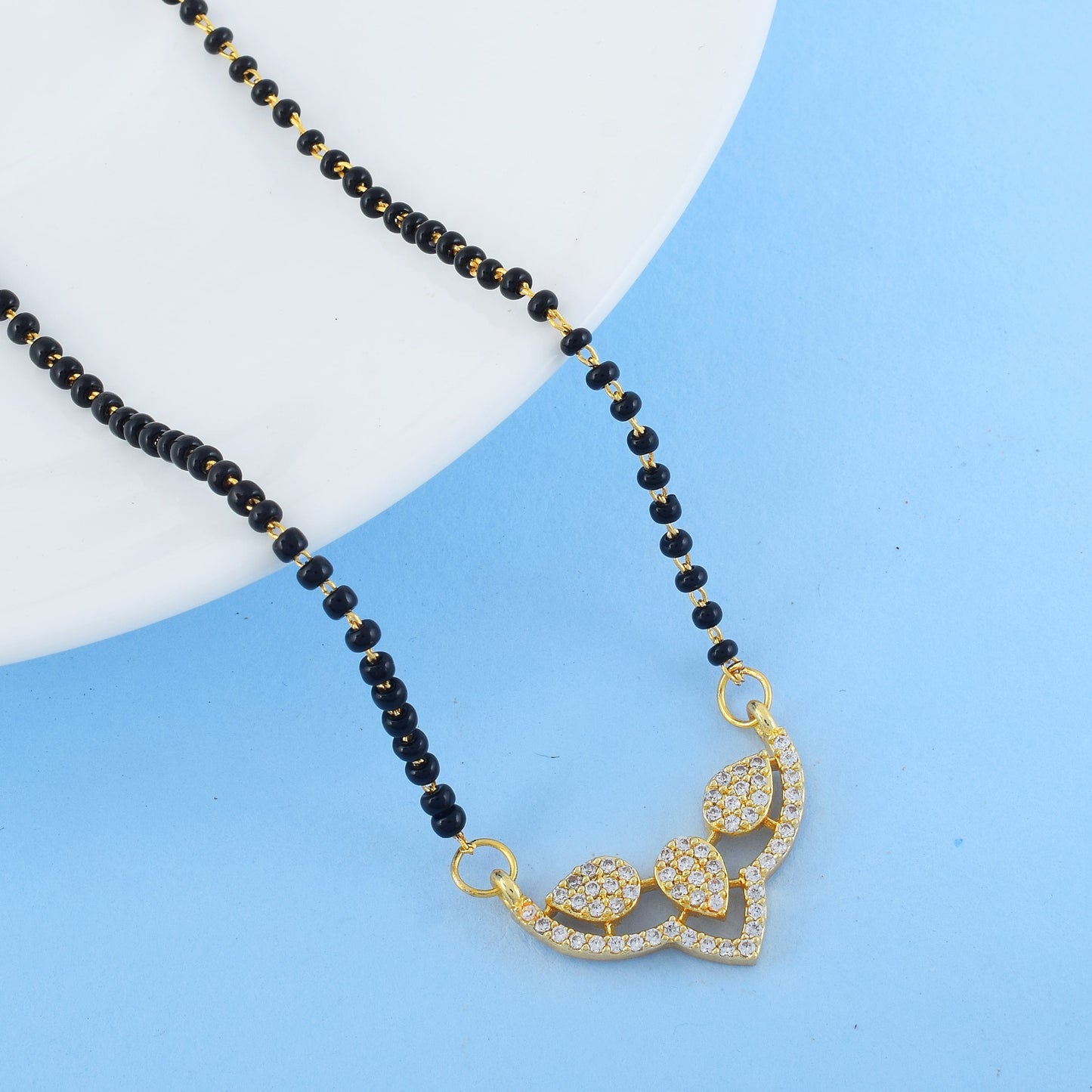 Gold Color American Diamond Mangalsutra With Center Heart Pendant Design