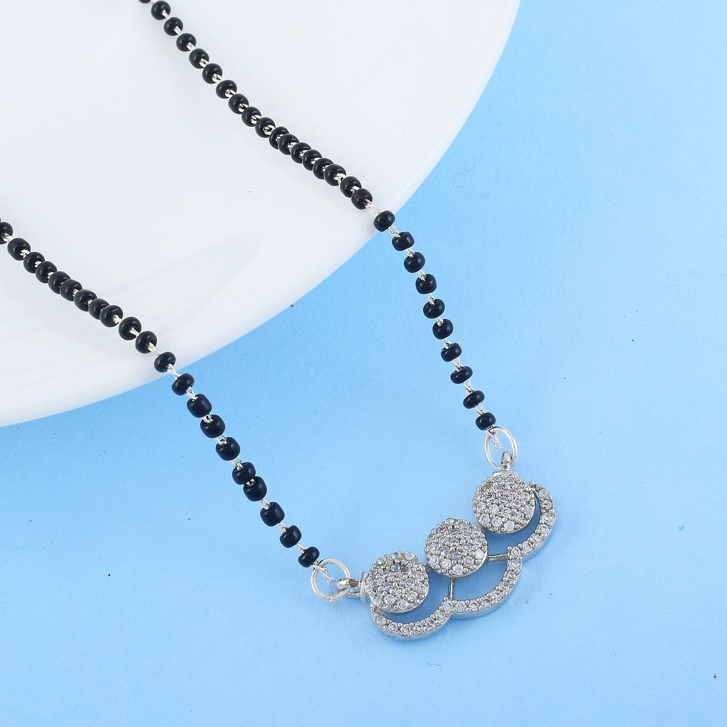 Silver Color American Diamond Mangalsutra Featuring Circular Center Charm
