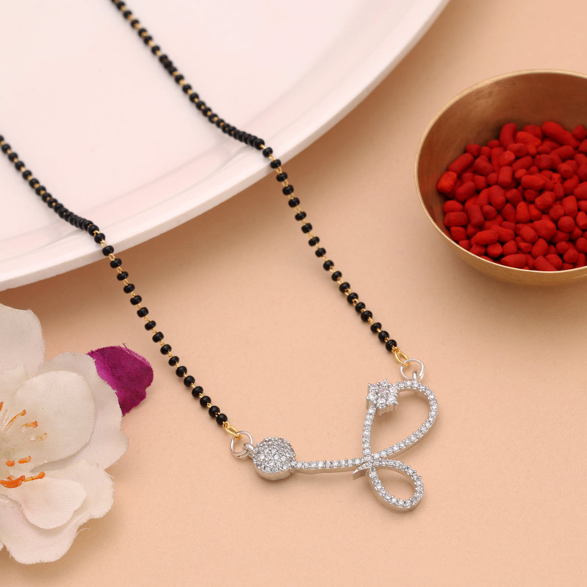Sleek Sterling Silver Color American Diamond Mangalsutra Designed For Modern Outfits