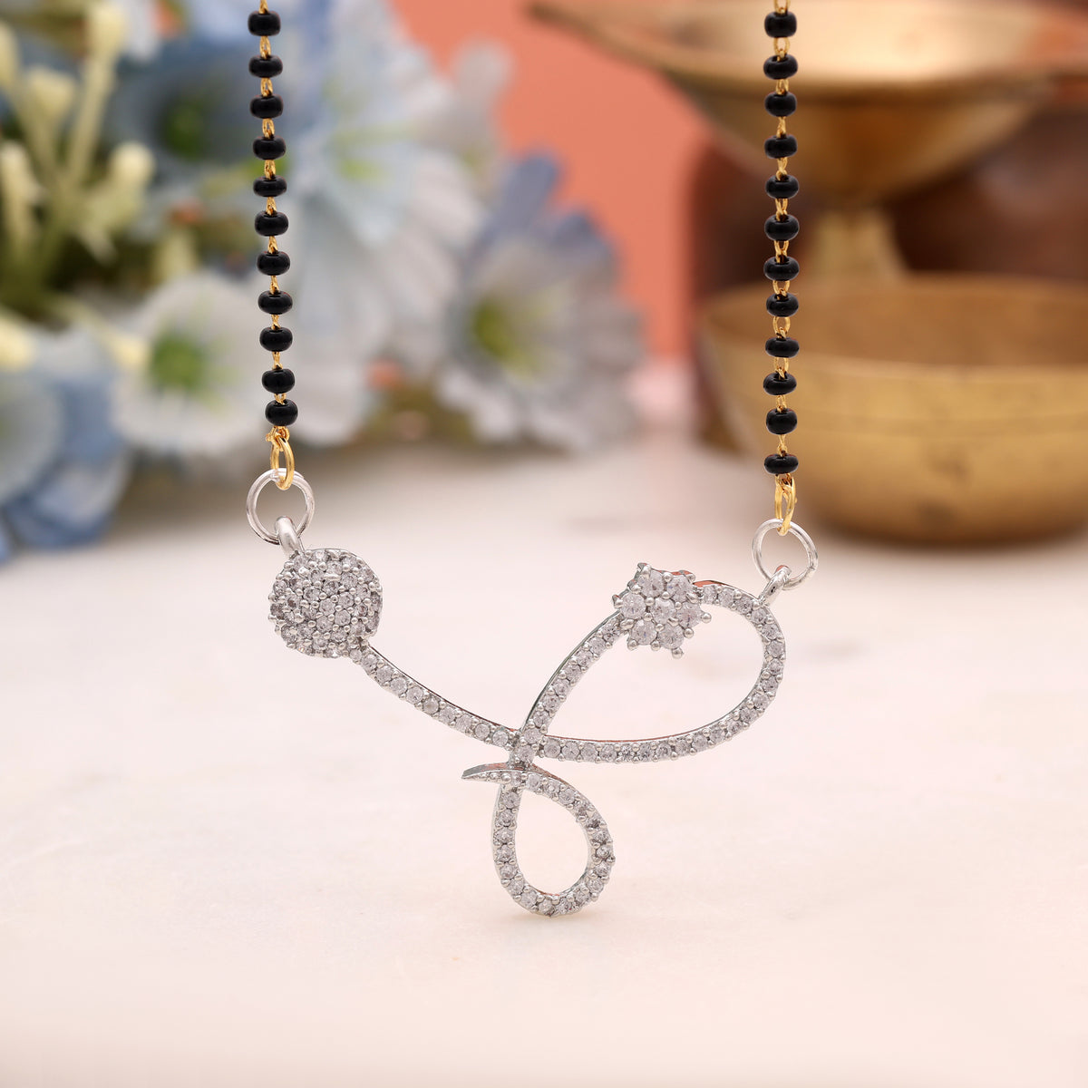 Sleek Sterling Silver Color American Diamond Mangalsutra Designed For Modern Outfits