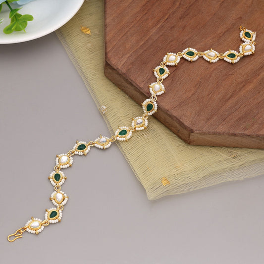 Green & White Color Kundan Matha Patti Showcasing Timeless Indian Bridal Elegance