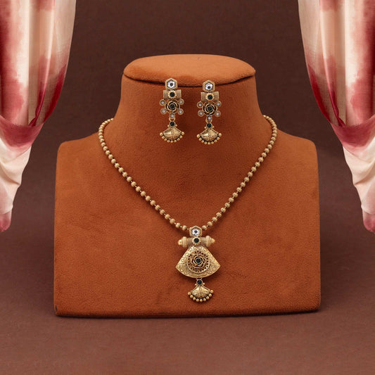 Vibrant Green Color Matte Gold Necklace Set Adorned With Intricate Detailing