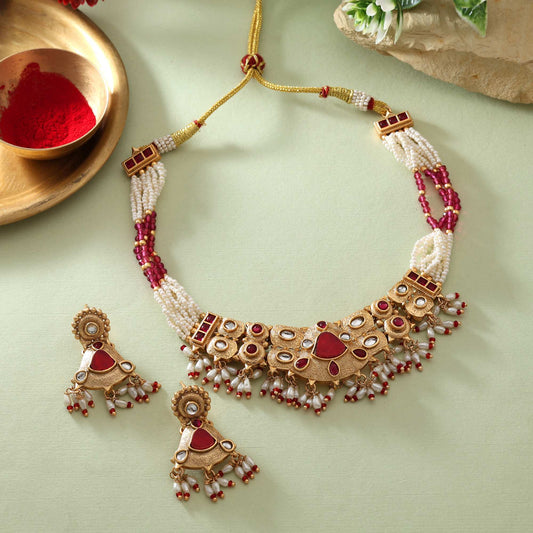 Captivating Rani Color Matte Gold Necklace Set With Beautiful Ornamental Detailing