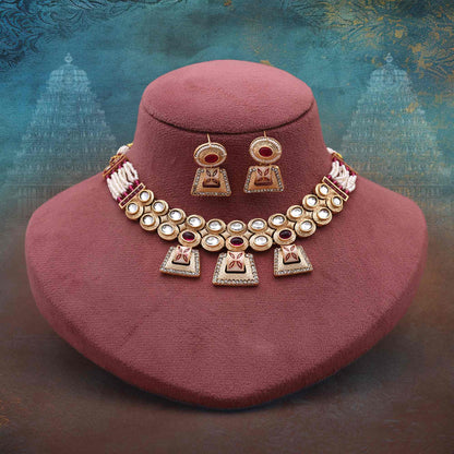 Eye-Catching Rani Color Matte Gold Necklace Set With Traditional Artistic Motifs