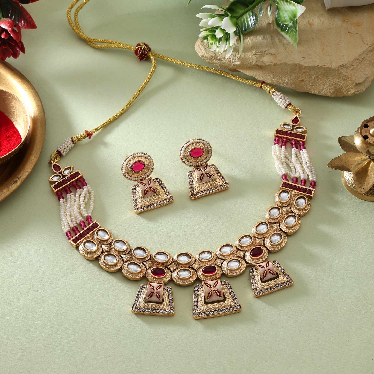 Eye-Catching Rani Color Matte Gold Necklace Set With Traditional Artistic Motifs