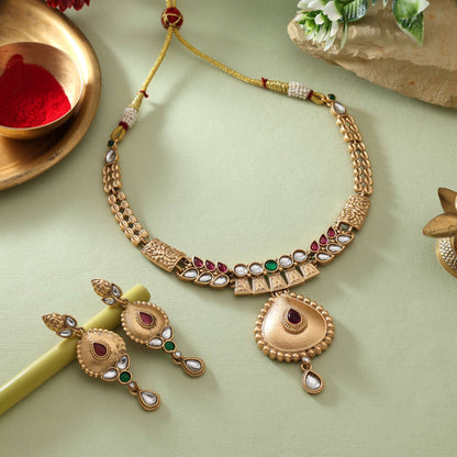 Ornate Rani And Green Color Matte Gold Necklace Set With Royal Embellishments