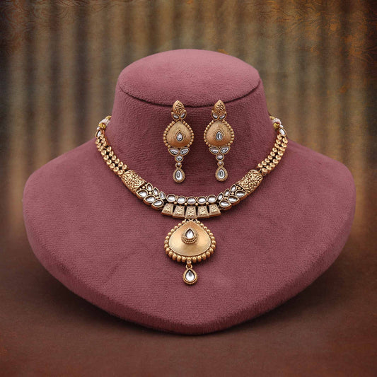 Stunning White Color Matte Gold Necklace Set Accented With Crystal Adornments