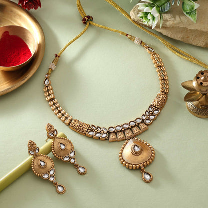 Stunning White Color Matte Gold Necklace Set Accented With Crystal Adornments