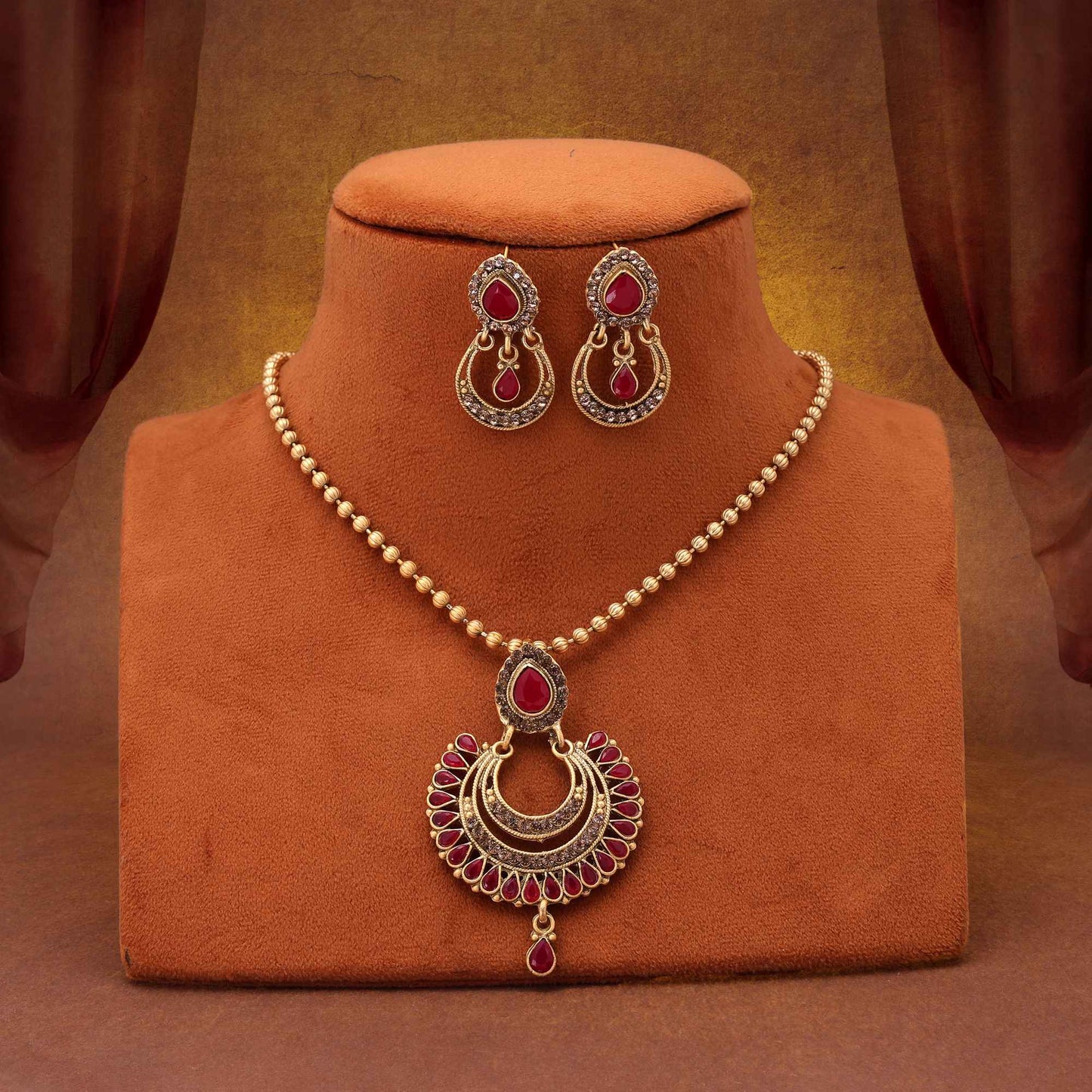 Traditional Rani Color Matte Gold Necklace Set Designed For Elegant Festivities