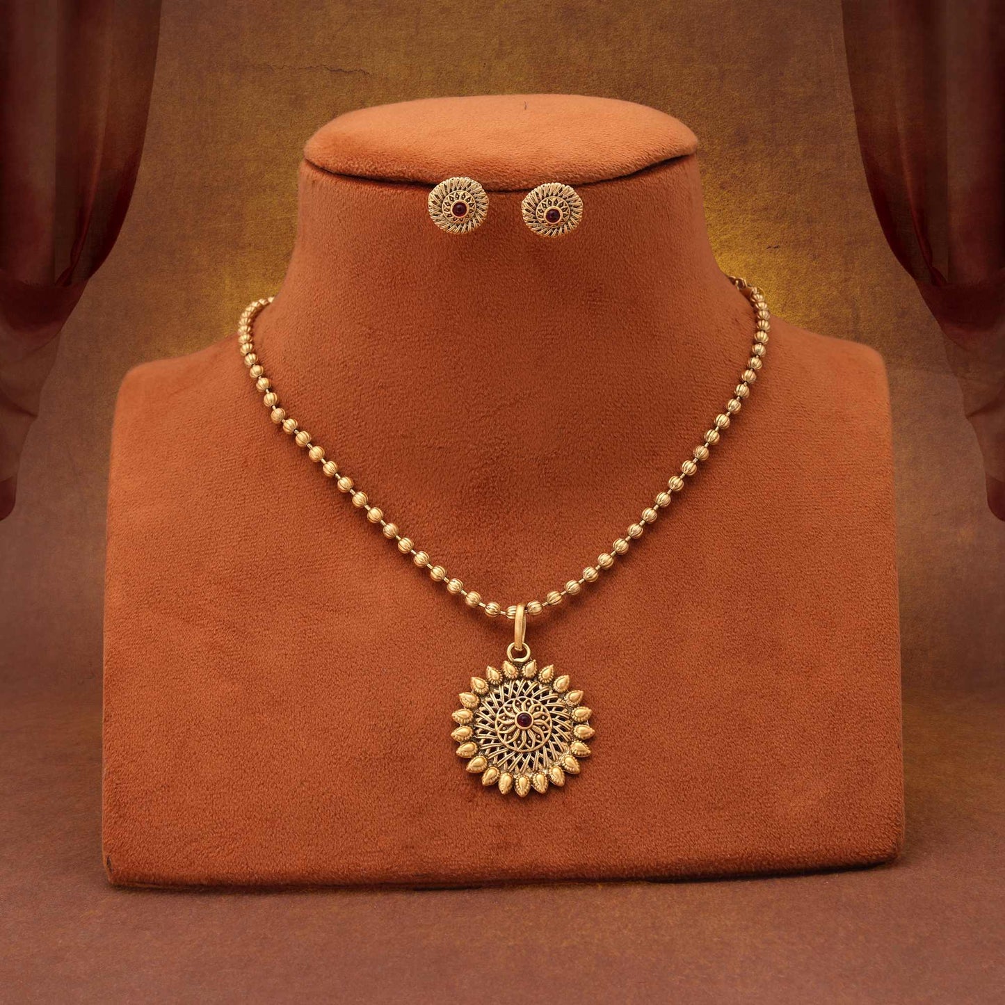 Elegant Rani Color Matte Gold Necklace Set With Artistic Floral Embellishments