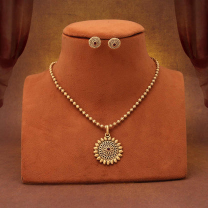 Elegant Rani Color Matte Gold Necklace Set With Artistic Floral Embellishments