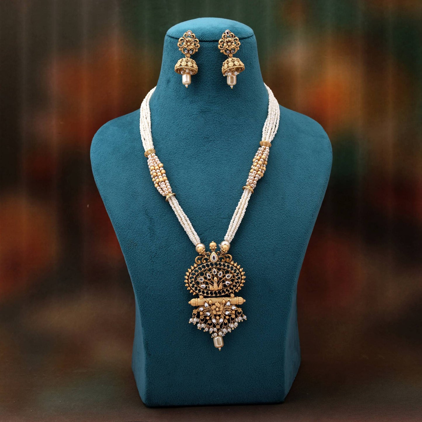 Grand Gold Color Matte Gold Necklace Set With Artistic Temple Inspired Craftsmanship