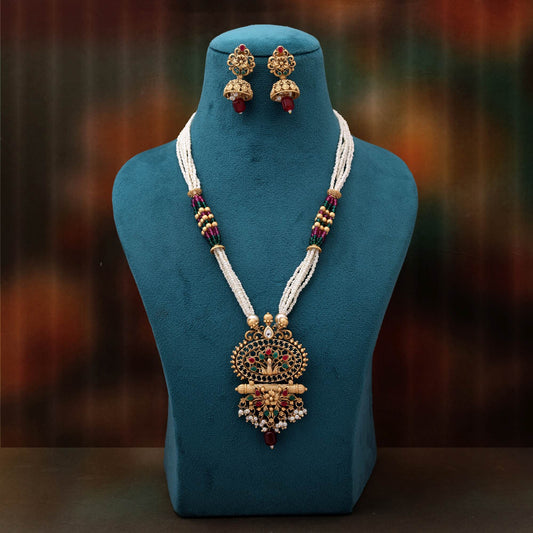 Charming Rani And Green Color Matte Gold Necklace Set Adorned With Kundan Work
