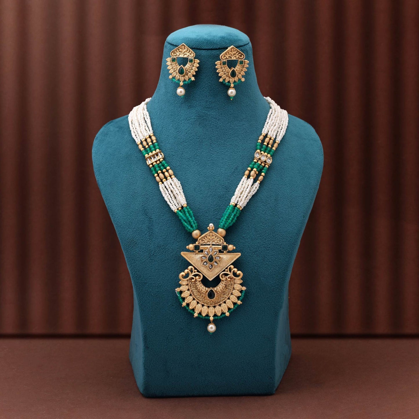 Vibrant Green Color Matte Gold Necklace Set Featuring Detailed Floral Meenakari Art Work