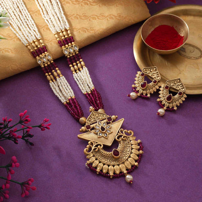 Gorgeous Rani Color Matte Gold Necklace Set With Premium Stone Embellished Temple Motifs