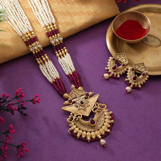 Gorgeous Rani Color Matte Gold Necklace Set With Premium Stone Embellished Temple Motifs