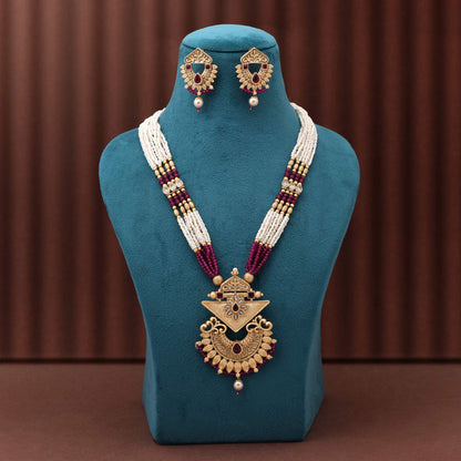 Gorgeous Rani Color Matte Gold Necklace Set With Premium Stone Embellished Temple Motifs