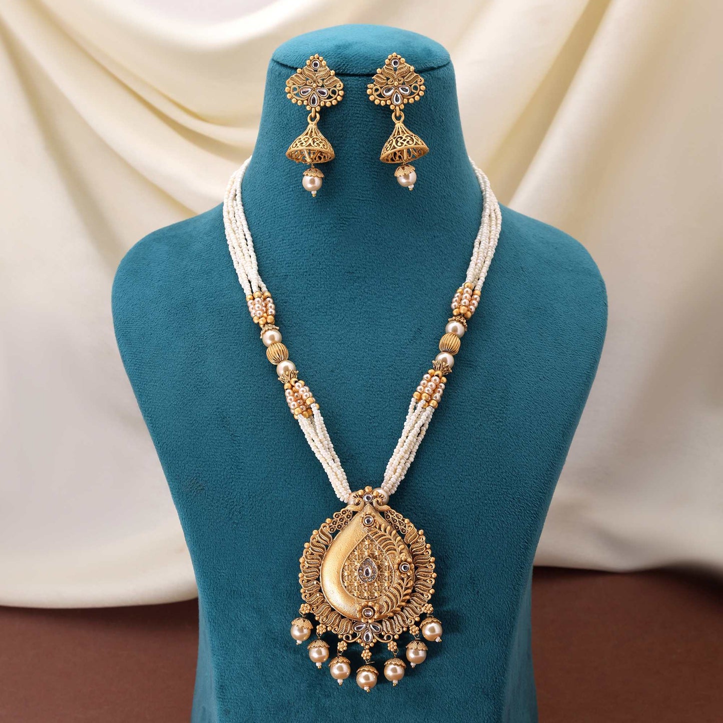 Classic Gold Color Matte Gold Necklace Set Designed With Traditional Ethnic Inspired Elements