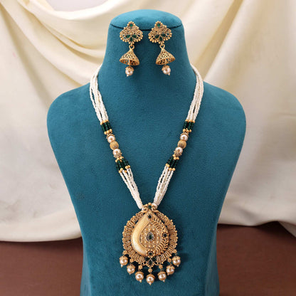 Radiant Green Color Matte Gold Necklace Set Adorned With Precious Stone Artistic Work
