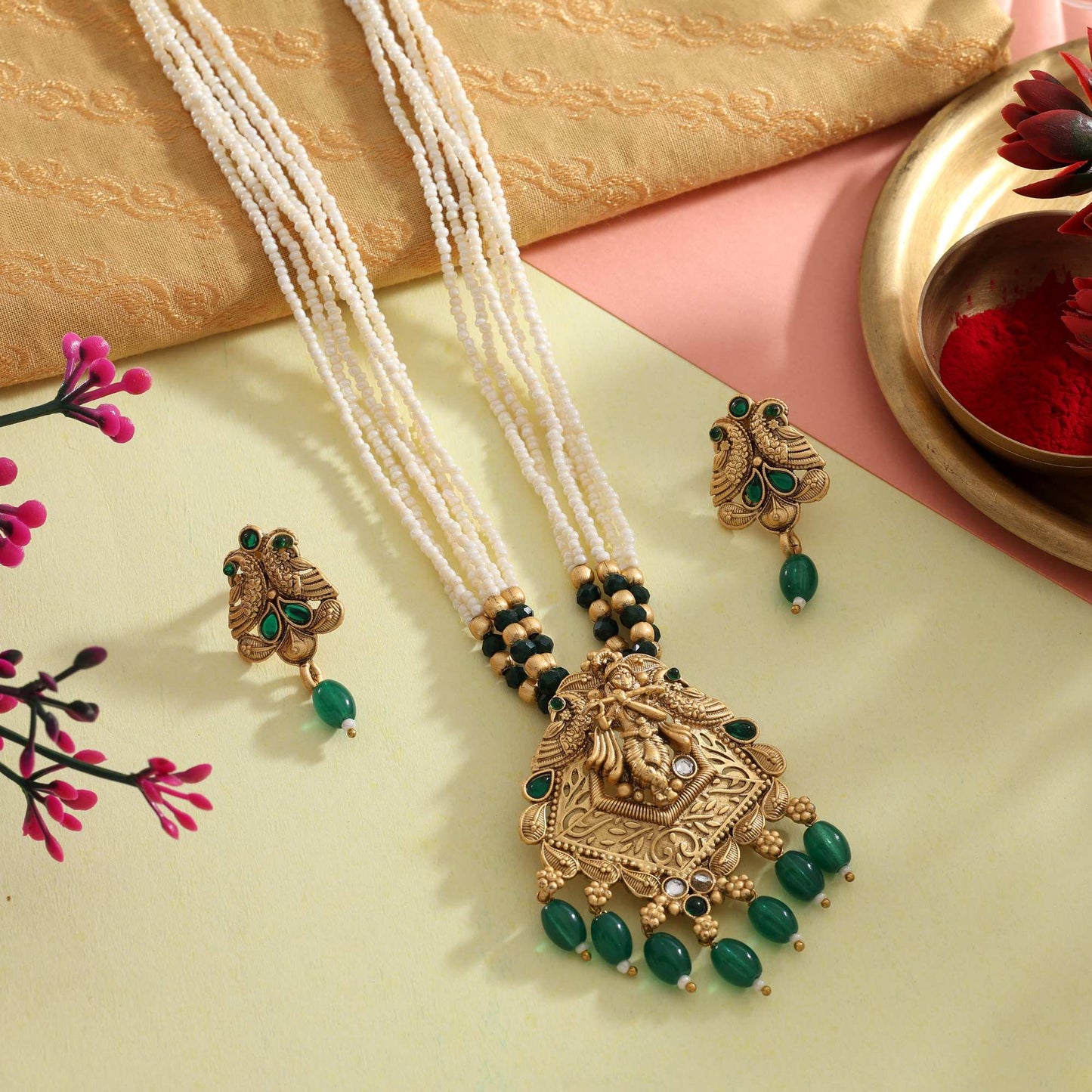 Captivating Green Color Matte Gold Necklace Set With Intricate Peacock Feather Inspired Design