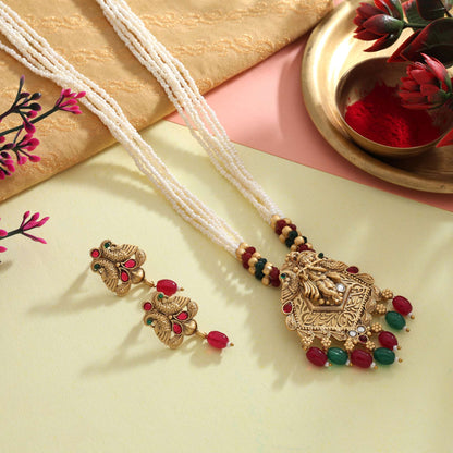 Luxurious Rani And Green Color Matte Gold Necklace Set Crafted With Polki Stone Accents