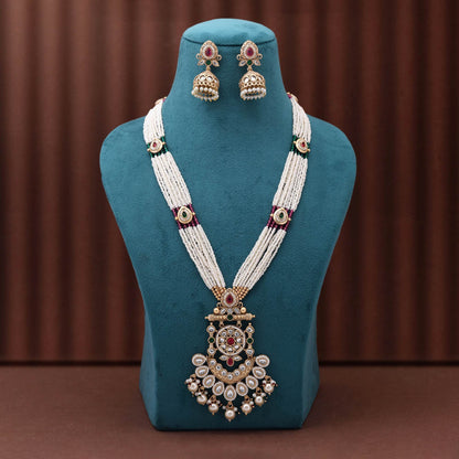 Charming Rani And Green Color Matte Gold Necklace Set Featuring Artistic Antique Polish Work